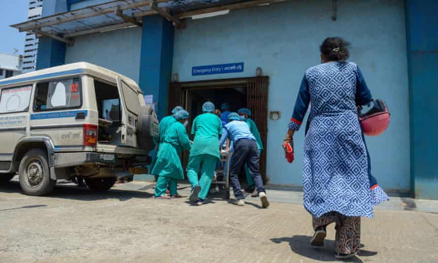 A Covid patient is admitted to hospital in Kolkata, West Bengal.