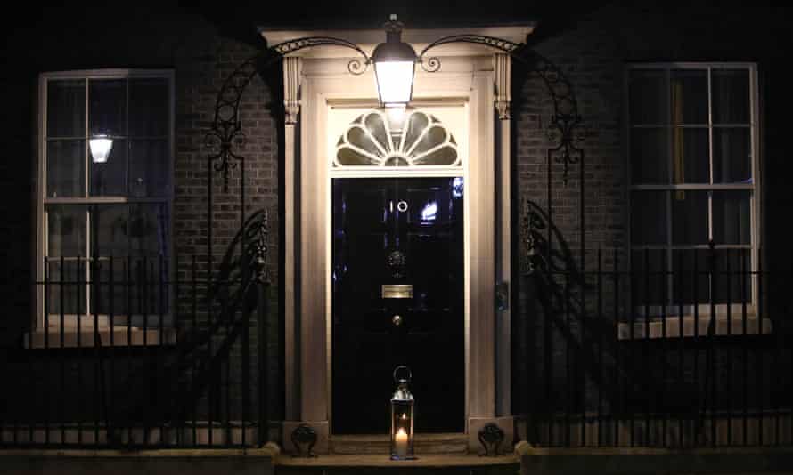 A candle lit by the prime minister Boris Johnson and his fiancee Carrie Symonds placed on the doorstep of Number 10 Downing Street in a doorstep vigil for Sarah Everard.