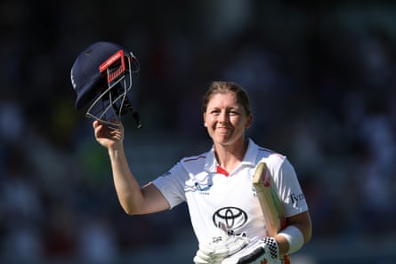 Heather Knight acknowledges the crowd holding her helmet in the air after her final innings during day three at Lord’s