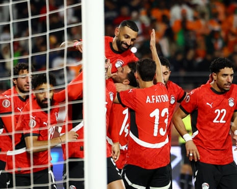 Mohamed Salah receives the acclaim of his Egypt teammates after scoring