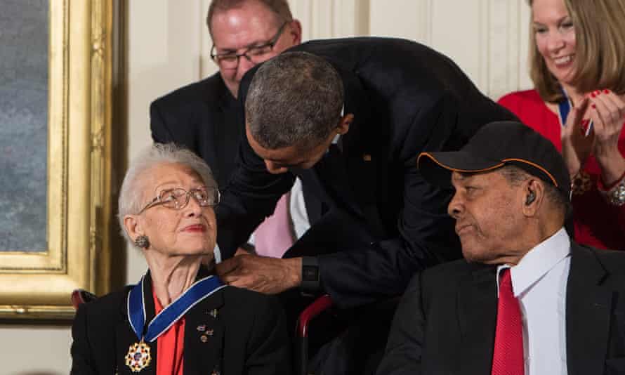 Barack Obama presents the presidential medal of freedom to Katherine Johnson at the White House in Washington DC on 24 November 2015.