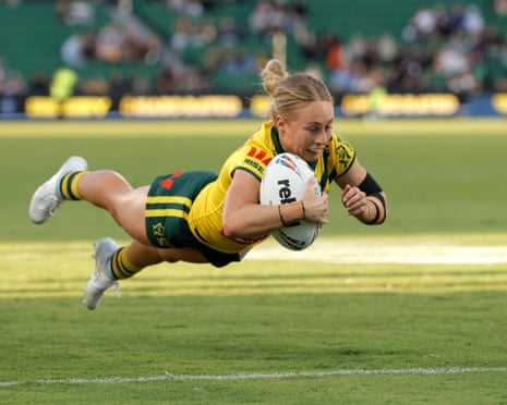 Abbi Church dives over the line for a try