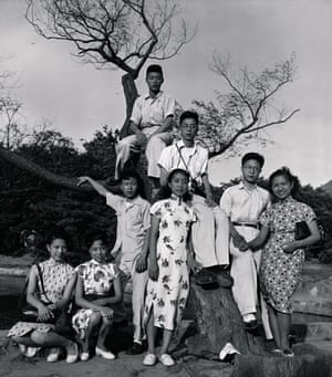 The lensman Zhou Haiying (sitting successful the histrion wearing glasses) joins with his stylish entourage of friends for a radical portrait, 1947