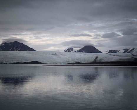 A view of Nordenskiold glacier melting and collapsing in the ocean, near Pyramiden, in Svalbard, a northern Norwegian archipelago on September 21, 2021
