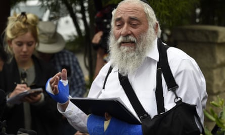Rabbi Yisroel Goldstein speaks at a news conference at the Chabad of Poway synagogue. AP Photo/Denis Poroy
