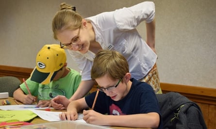 Hannah Rodabaugh assists students at the Log Cabin Literary Center in Boise, Idaho.