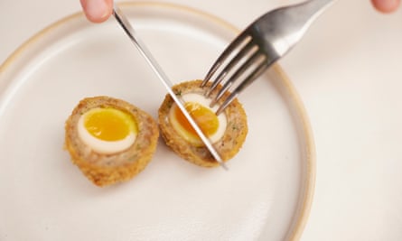 A scotch egg cut in half