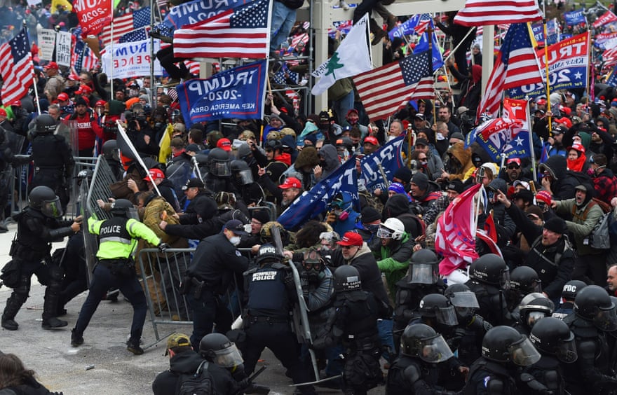Rioters clash with police and security forces as they storm the US Capitol.
