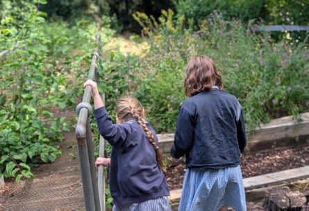 Beatrix (left) and Rosalind in the nature area of their school