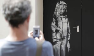 Thieves Drive Off With Banksy Mural On Bataclan Fire Door World News The Guardian