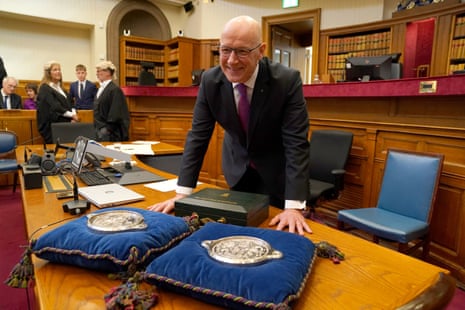 Swinney with the Seals of Scotland (he is now officially keeper of them, whatever that means) at the court of session.