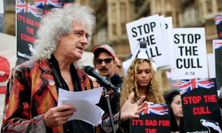 The Queen guitarist Brian May leads a protest march in 2015 against the killing of badgers