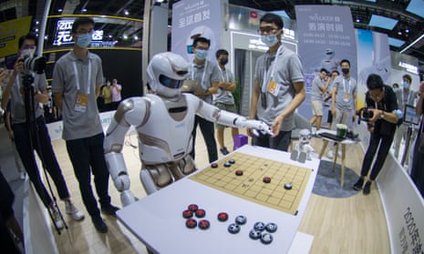 An AI fair in Shanghai, China, which is one of the countries investing heavily in the technology along with synthetic biology, MI6 boss Richard Moore says.