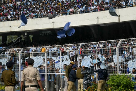 Seats are thrown the stands at Salt Lake Stadium