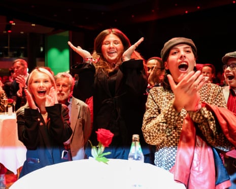 Supporters of Sweden's Social Democratic party react to early results of the general election in Stockholm, Sweden.