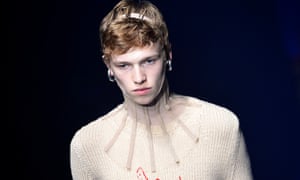 A model presents a creation by Gucci at the Milan show on Wednesday.