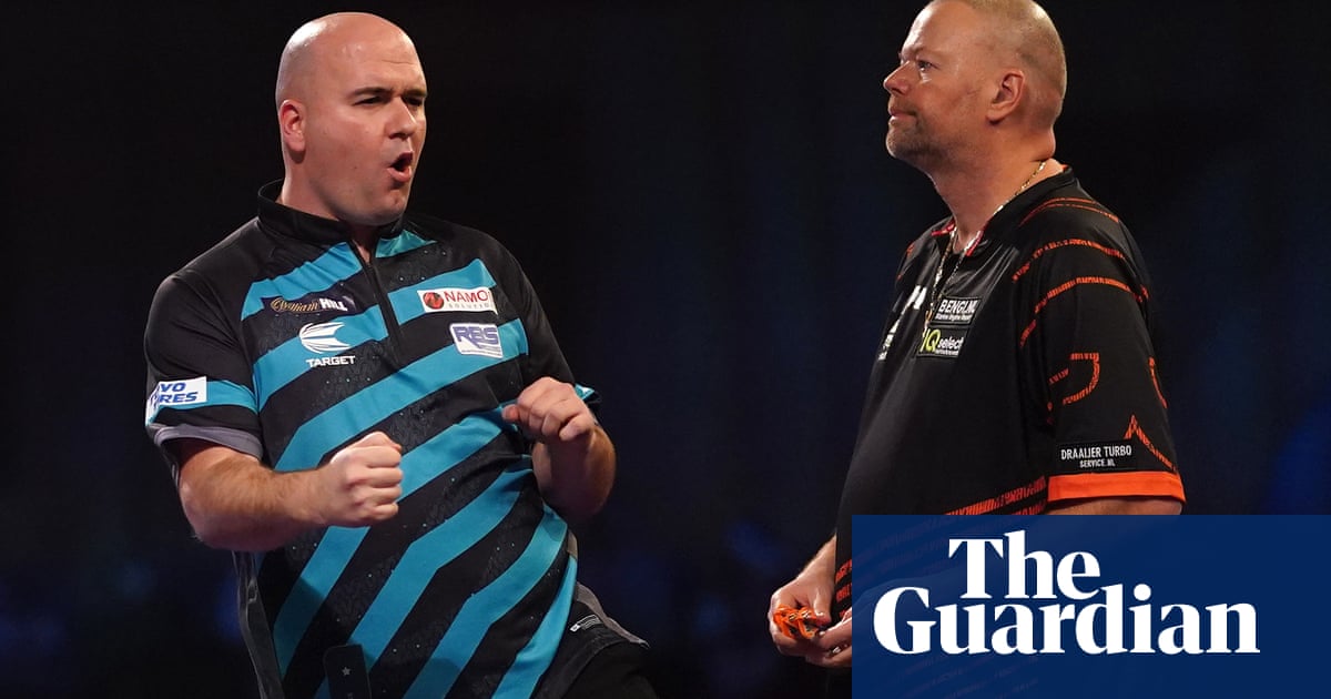 Raymond van Barneveld knocked out of PDC world championship by Rob Cross