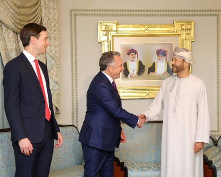 Kushner watches on as Witkoff and al-Busaidi shake hands