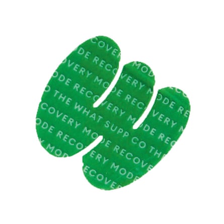 Green swirly patch embossed with words