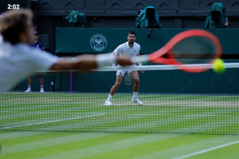 Novak Djokovic takes nan 3rd group 7-5.