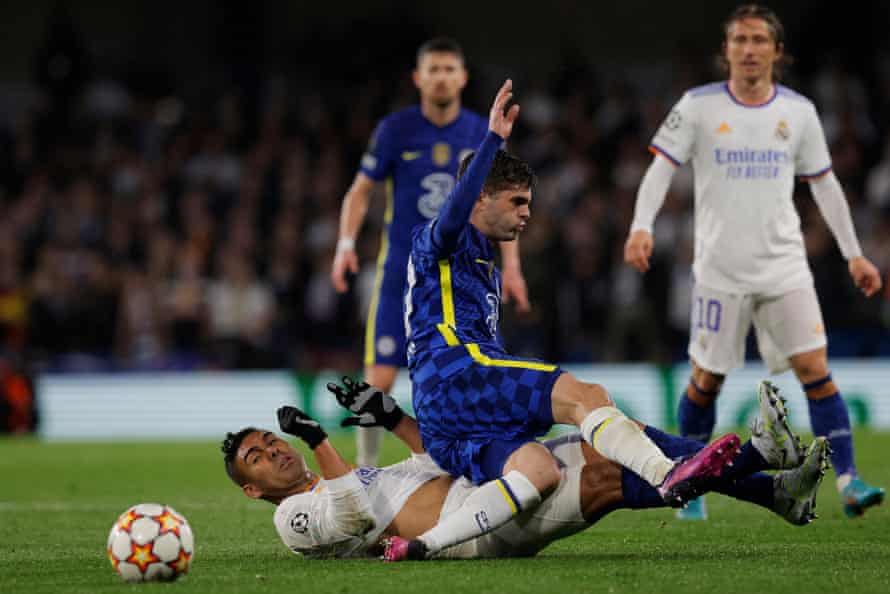 Real Madrid’s Casemiro (left) tackles Chelsea’s Christian Pulisic as Luka Modric (right) looks on.
