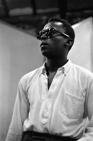 Miles Davis, birth of coolMiles Davis not only captured the mood of the times he often directed it. When he began to wear Ivy League clothing – something noted not only by musicians and fans but in the media, too – he played one of the most important roles in the birth of the movement. Here he is pushing the Ivy limits in typical Black Ivy style wearing a terry cloth pop-over button shirt and shades.