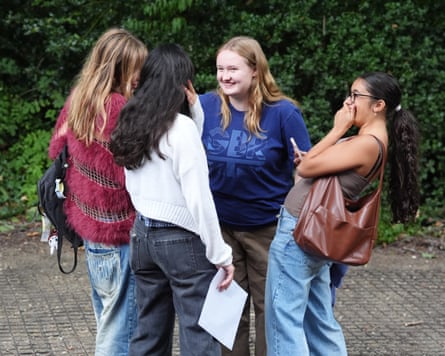 Pupils looking happy as they receive their GCSE results
