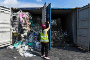 Containers filled with plastic waste are seen before being sent back to their countries of origin in Port Klang, Malaysia.