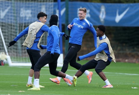Liam Delap (centre) with Facundo Buonanotte and teammates during Chelsea training.