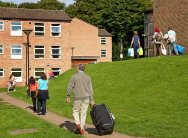 Parents helping fresher students move into halls of residence in Birmingham