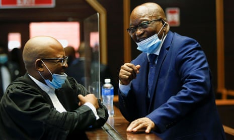 Jacob Zuma speaks with a member of his legal team at the high court in Pietermaritzburg, South Africa