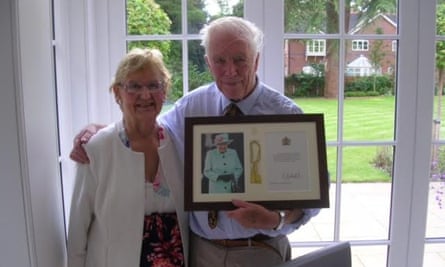Valerie and Peter Williamson with a framed letter of congratulations from the Queen, on their diamond wedding anniversary in 2019.