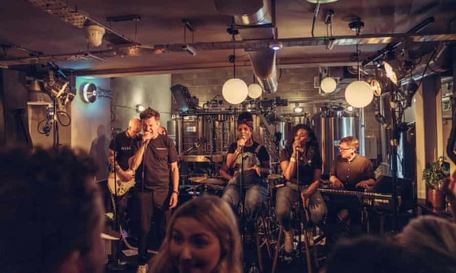 ‘Working in a pub is hard, I don’t work here!’ … Astley co-owns the Mikkeller Brewpub in London.