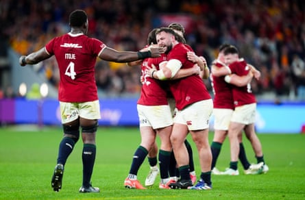 Maro Itoje (left) runs to celebrate with his victorious British & Irish Lions teammates.