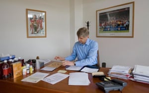 Arsène Wenger at his desk at Arsenal’s training ground in 2007. The club without him will take some getting used to.