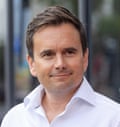 Richard Walker in open-necked white shirt
