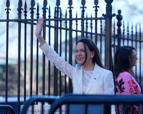 María Corina Machado waves to supporters as she leaves the White House, 15 January 2026.