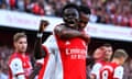 Bukayo Saka celebrates scoring a goal against Tottenham