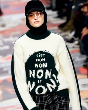 Theseason’s opening look was a sweater with a feisty intarsia logo