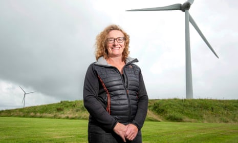 Juliet Davenport, founder and chief executive of Good Energy in front of wind turbines