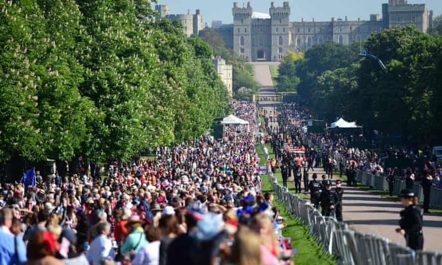 Royal fans line the Long Walk in Windsor towards the castle.