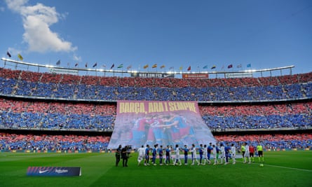Barcelona fans display a banner before kick-off.