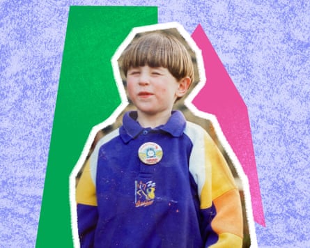 Young boy wearing a blue and yellow fleece top with a bowl haircut