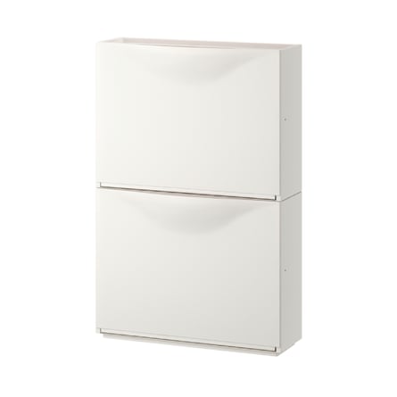 A white shoe cabinet with two fold down compartments