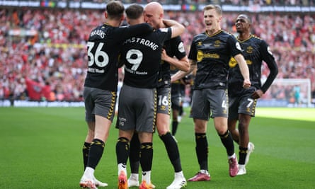 Southampton players celebrate the winning goal.