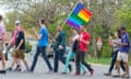 Wajeeh Lion, the Saudi LGBTQ+ activist, waves a rainbow version of the US flag.