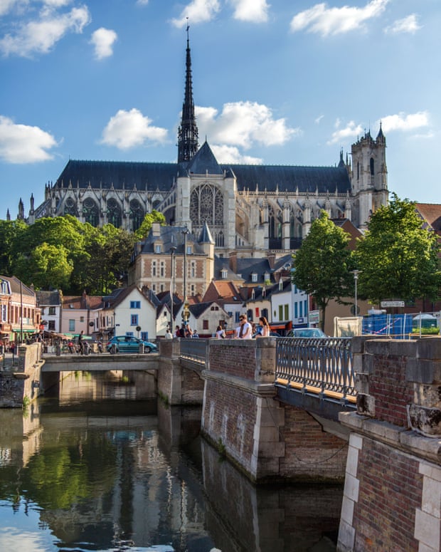 A cathedral overlooks the water