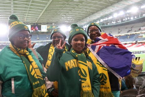 Matildas fans pose for a photo inside Marvel Stadium.