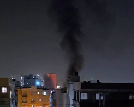 Smoke rises in Bnei Brak after the attack.