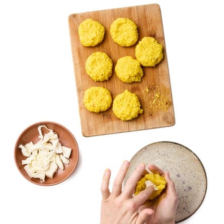 Step 5c Felicity Cloake How To Make T Arancini... rolling the arancini ino flat balls.